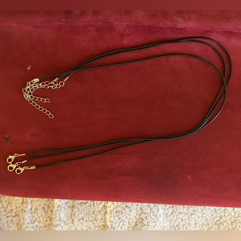 3 for $10.  Black Chokers $7 pendants